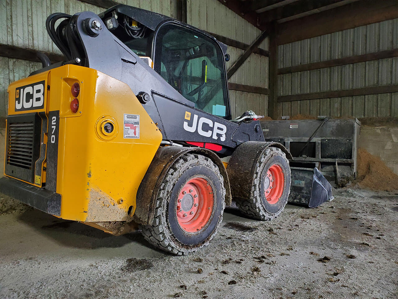 Dirty Bobcat Skidloader after used with D-Fenders