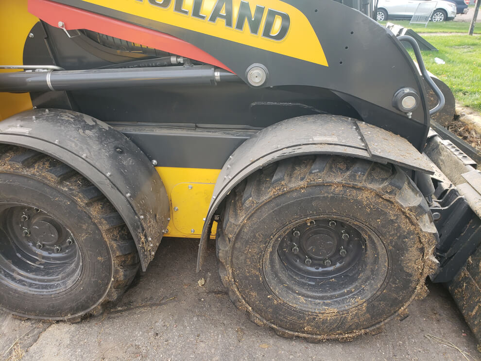 New Holland Skidloader using D-Fenders