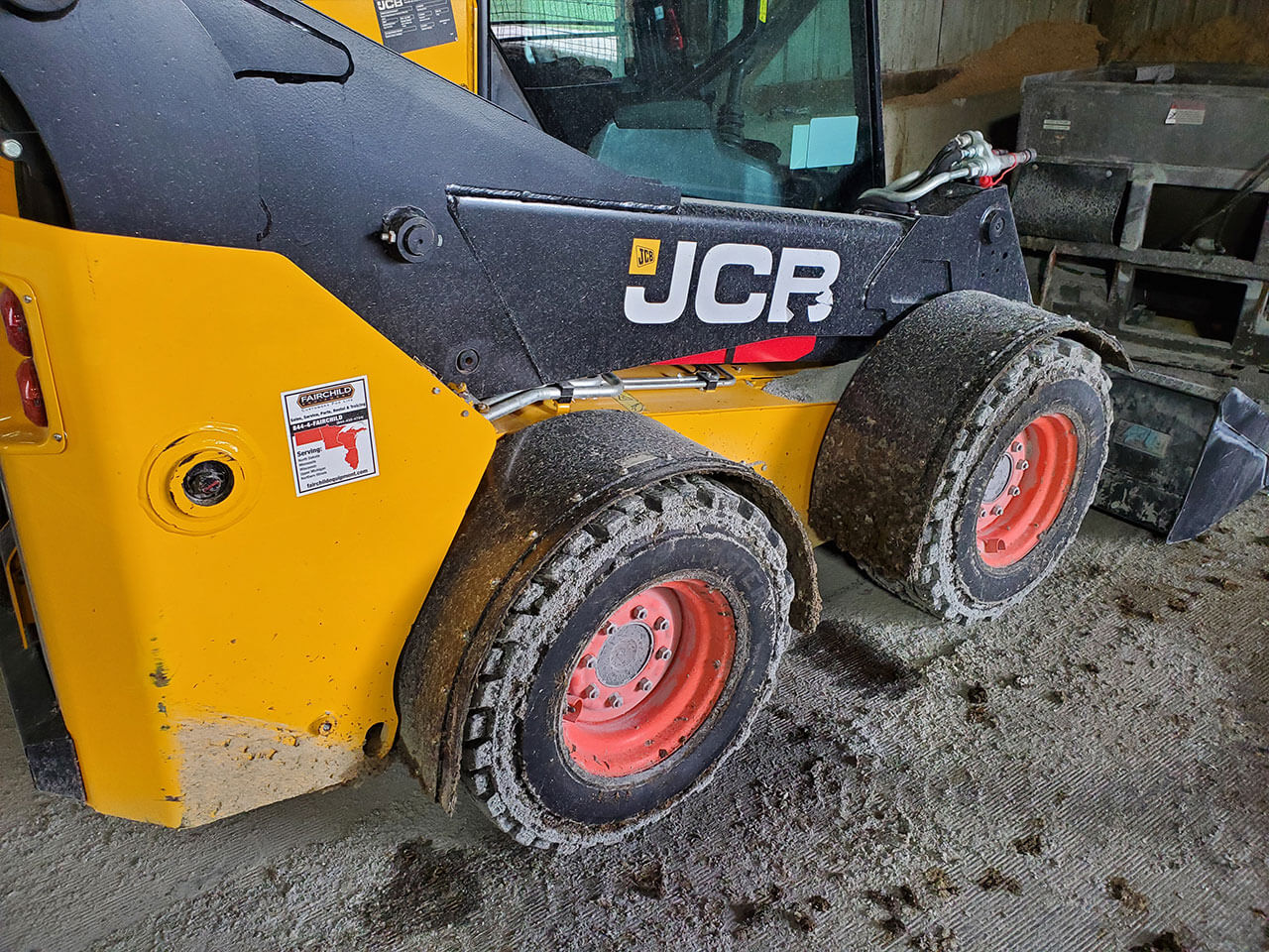 Dirty Bobcat Skidloader after used with D-Fenders