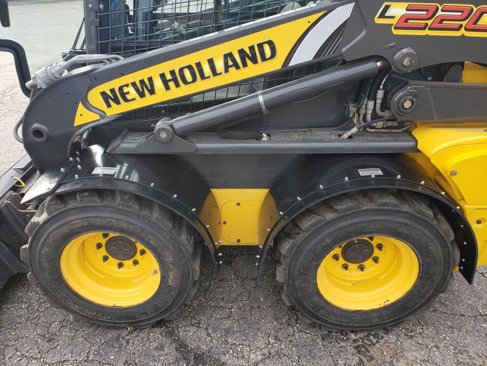 New Holland L220 Vertical Lift Fender In Use
